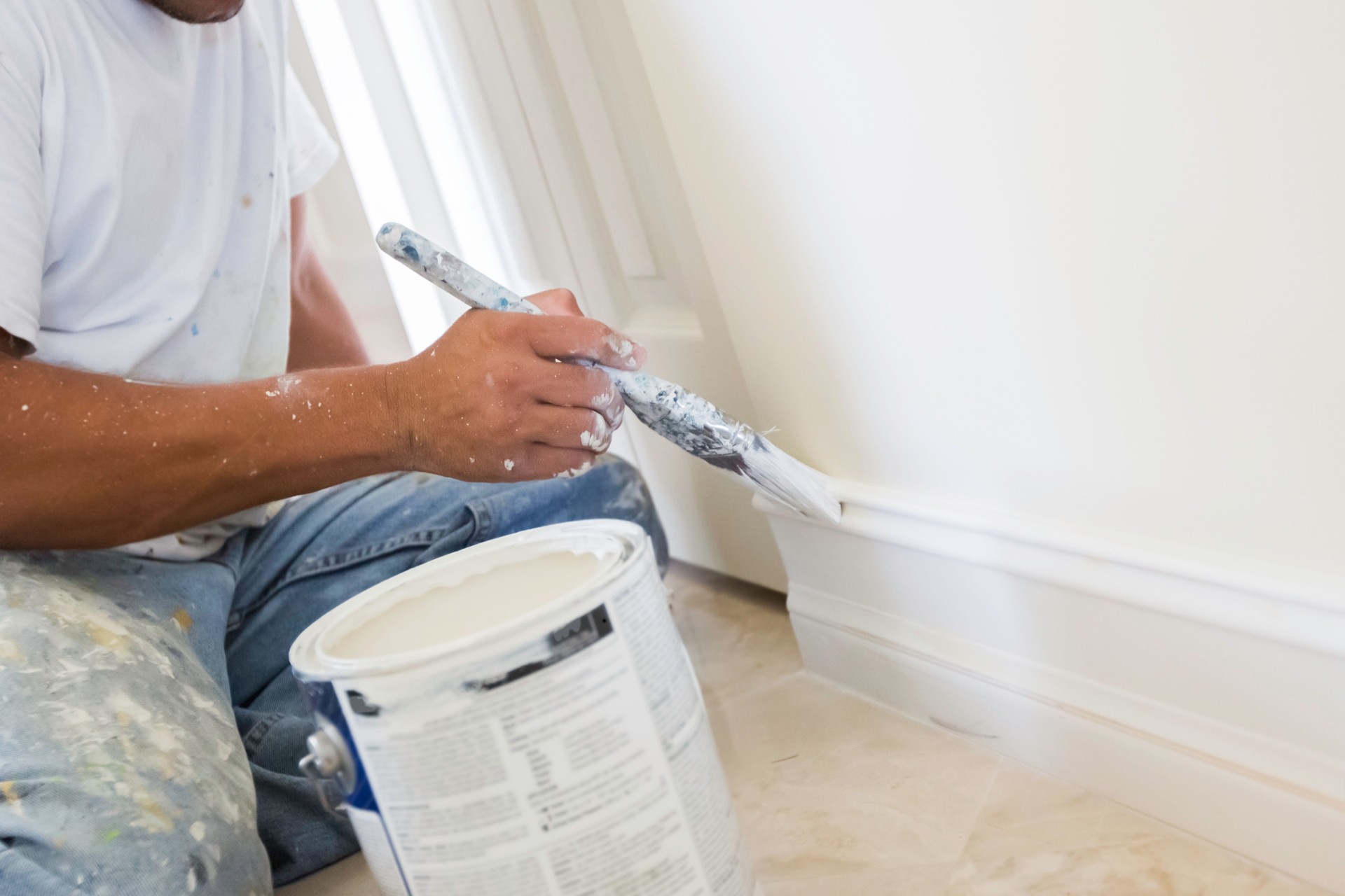 painter painting wood trim